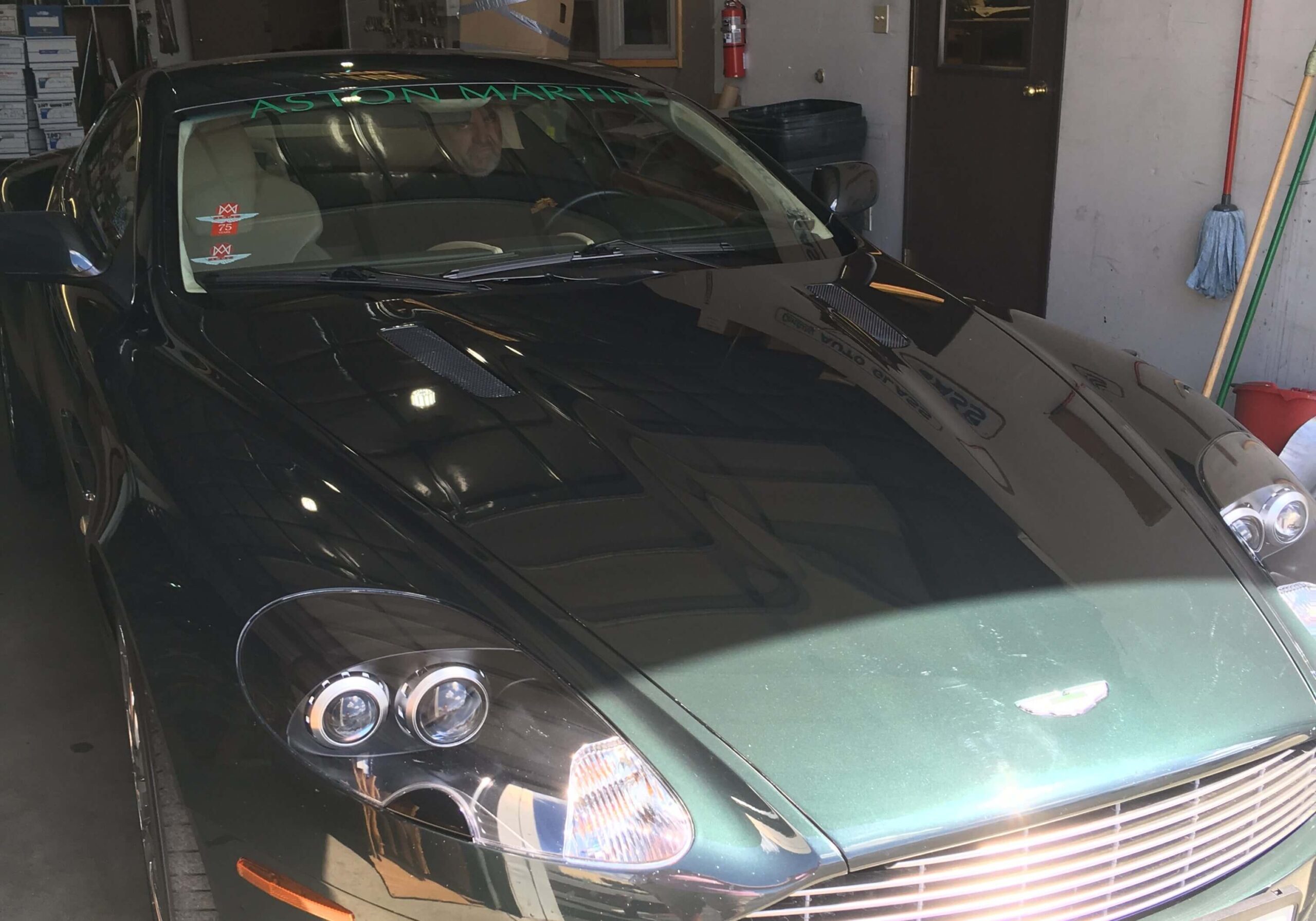 A car that is parked in the driveway.